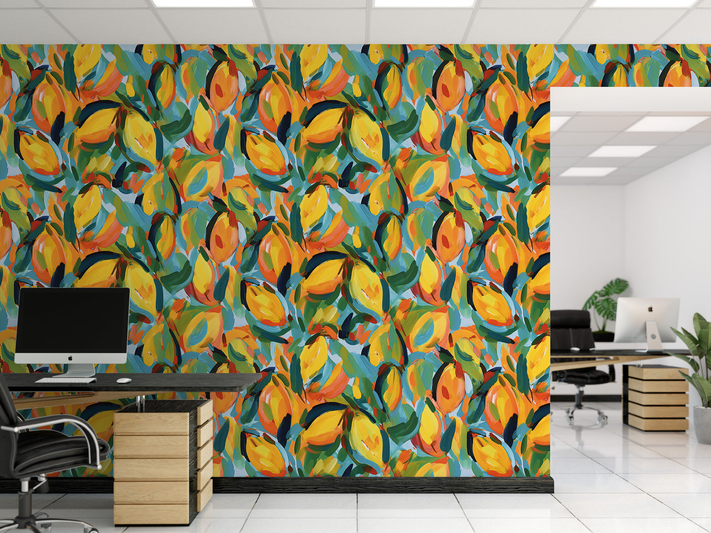 a modern office space with a vibrant, colorful mural on the wall behind a desk. The mural is a repeating pattern of yellow and orange leaves, creating a lively and energetic atmosphere. The office also includes a computer setup, including a monitor, keyboard, and mouse, as well as a potted plant and a chair, contributing to a comfortable and functional workspace.