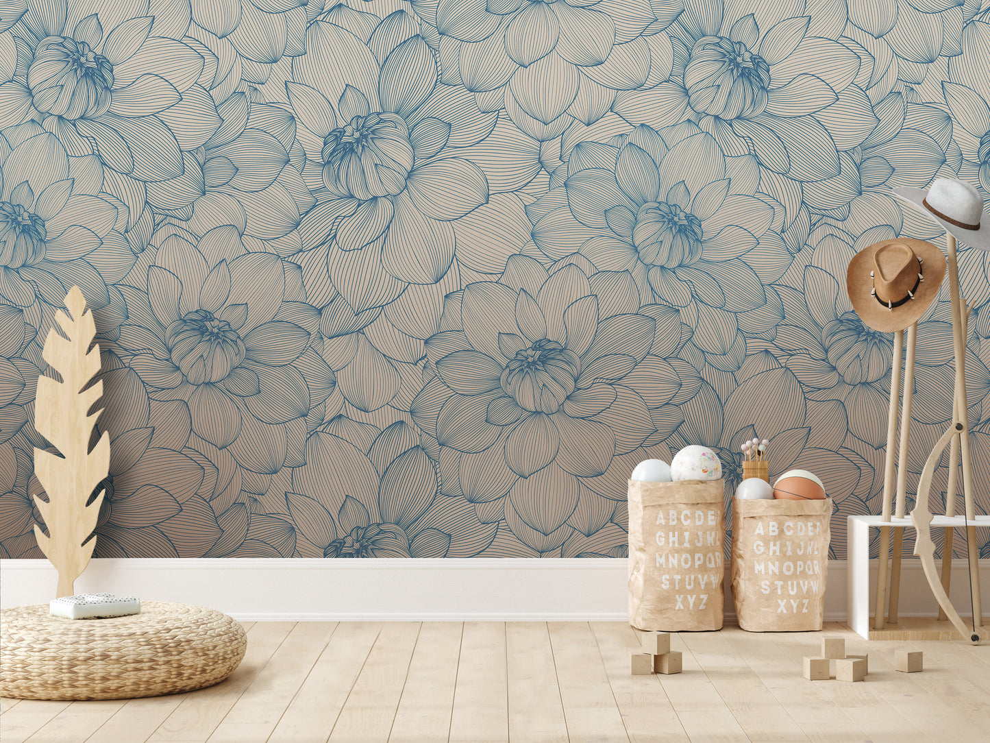 a room with a blue and white floral wallpaper, a wicker basket, and a wooden stool. There are also two wooden crates with letters on them, and a wooden shelf with a hat and a feather.