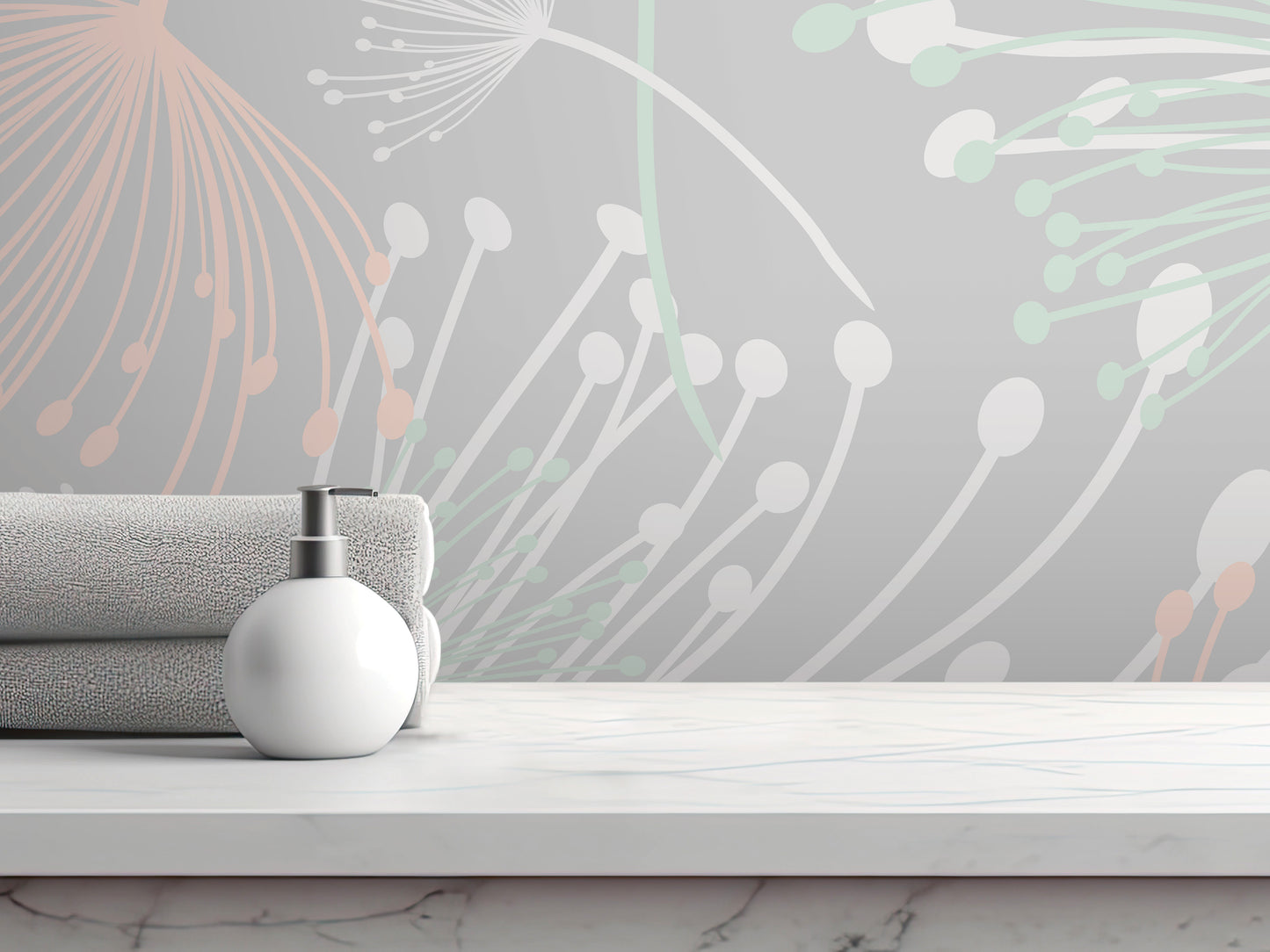 A white soap dispenser sits on a white marble countertop, with rolled towels and a gray and white floral patterned wall behind it.