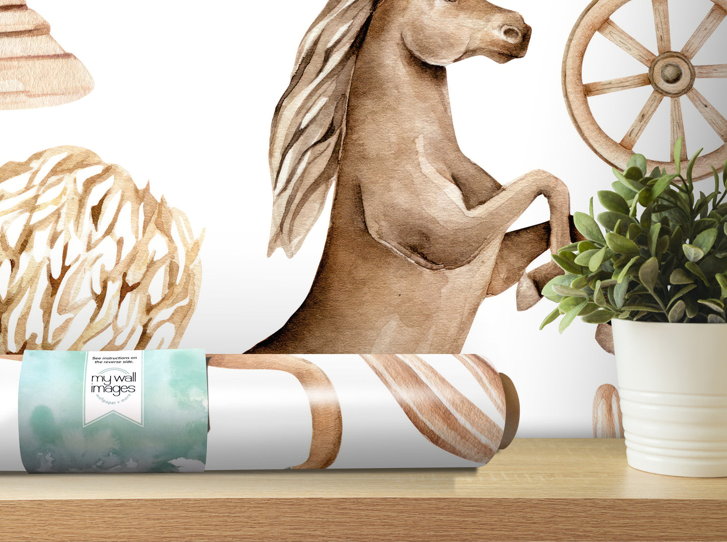 a large brown horse on a white wall, with a potted plant and a roll of wallpaper in the foreground.