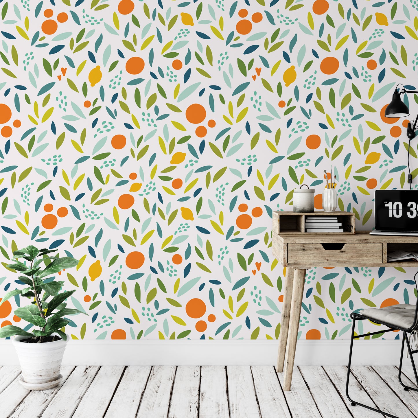 a vibrant and colorful wallpapered wall with a repeating pattern of orange and green leaves, creating a lively and energetic atmosphere. In the foreground, there is a wooden desk with a laptop and a potted plant, suggesting a workspace or a cozy corner.