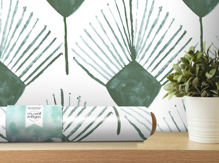 a wallpapered wall with a repeating pattern of green and white lines, and a potted plant placed on a wooden shelf in the foreground.