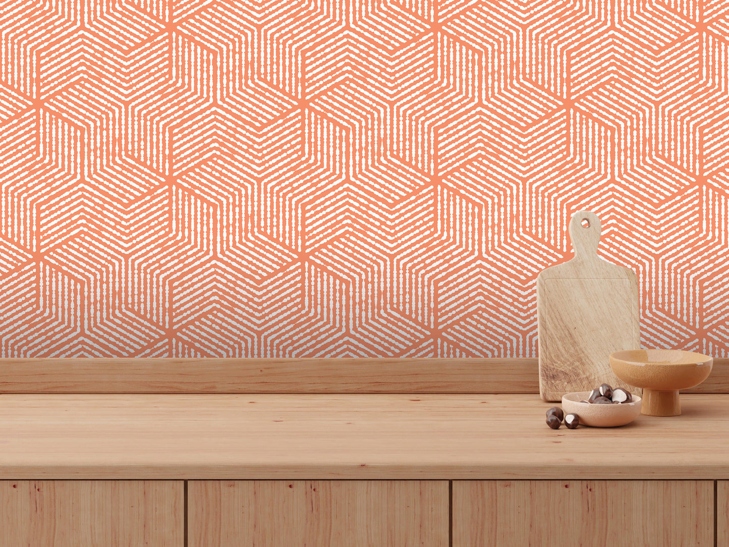 a wooden table with a wooden cutting board, a bowl, and a small wooden bowl on it. The table is set against a wall with a geometric pattern in shades of orange and white.