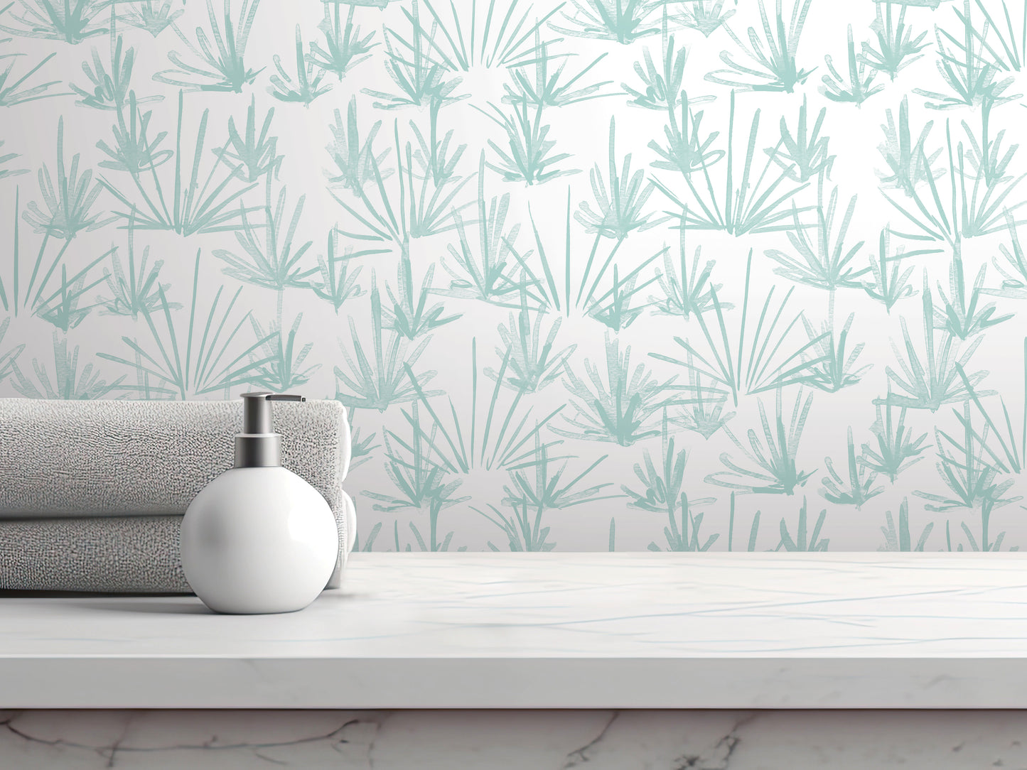 a white countertop with a white soap dispenser and a folded towel, set against a wall with a repeating pattern of green and white plants or flowers.