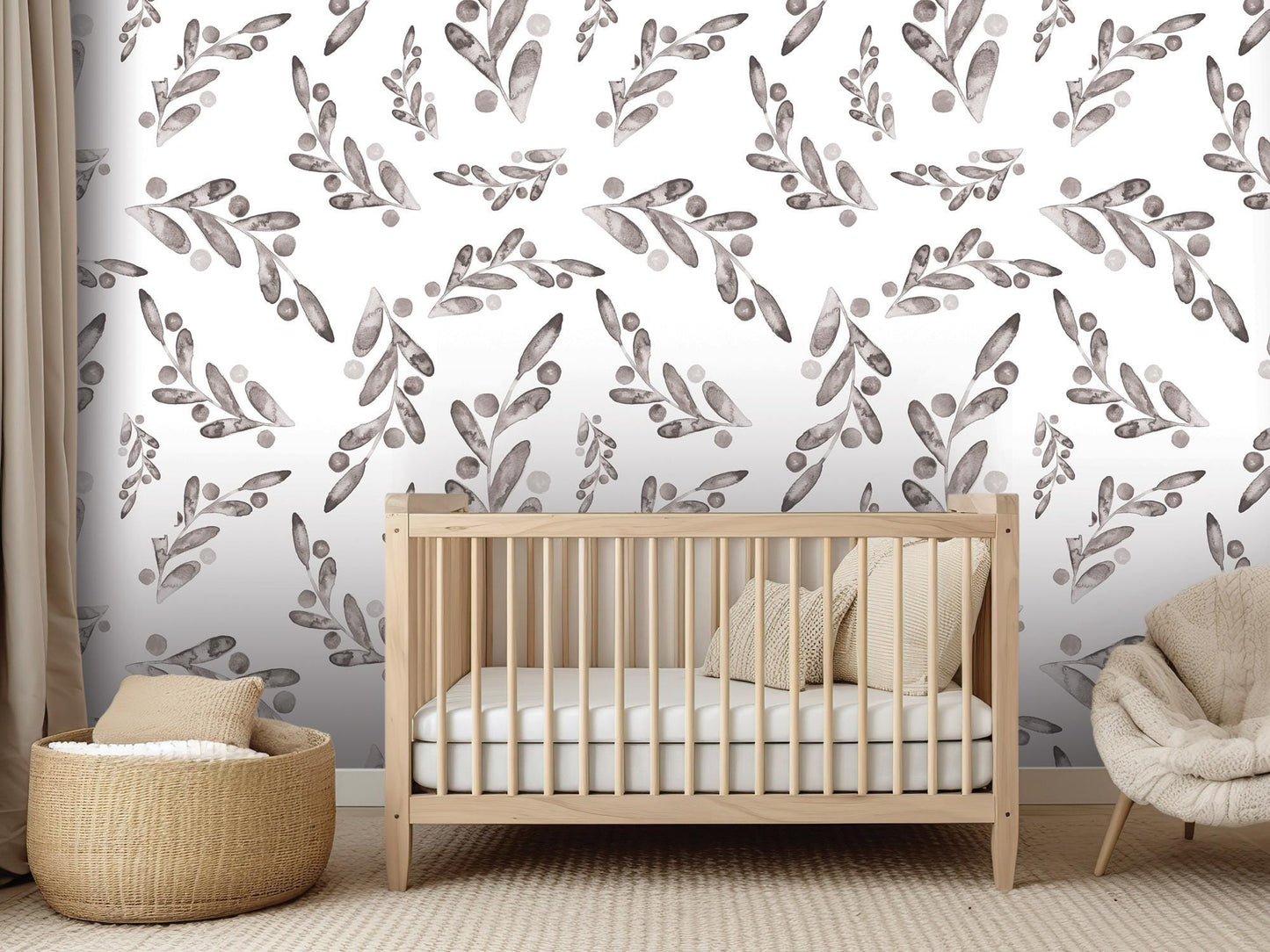 a baby&#39;s room with a crib, chair, and wallpaper