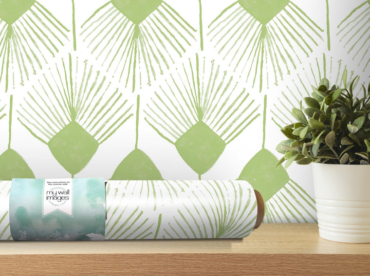 a green plant sitting on top of a wooden table