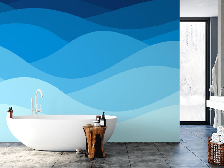 a white bath tub sitting next to a white sink