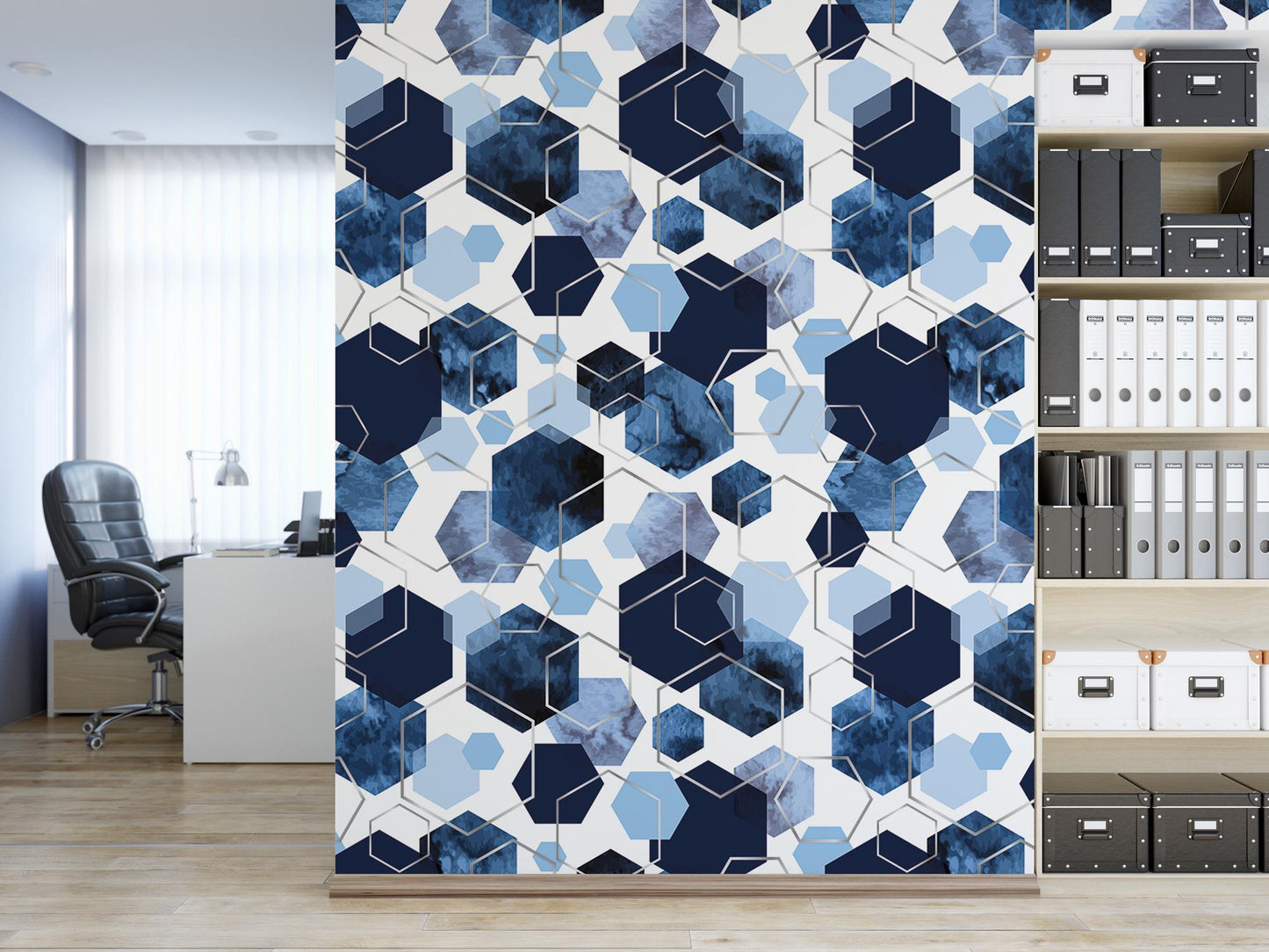 a room with a book shelf and a wall with a pattern of hexagonal