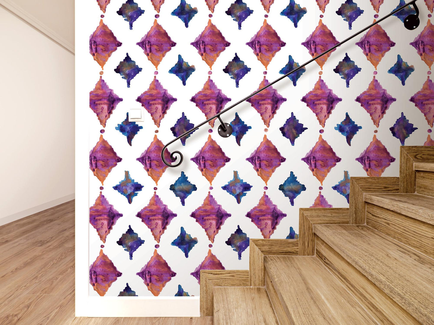 a stair case next to a wall with a pattern on it