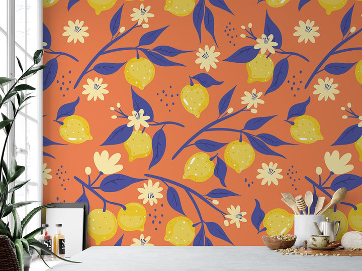 an orange wall with blue and yellow flowers on it