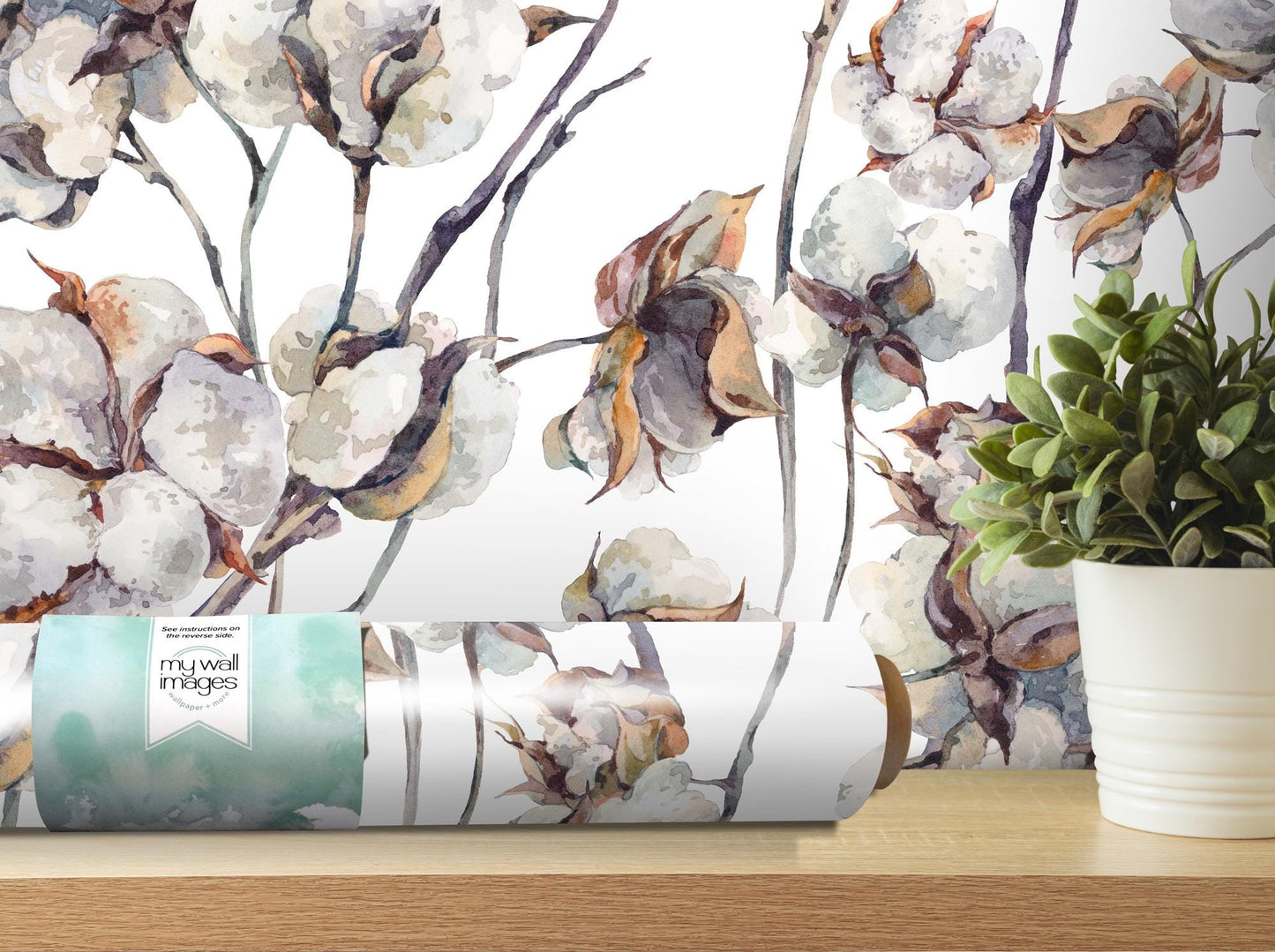a vase of flowers sitting on top of a wooden table