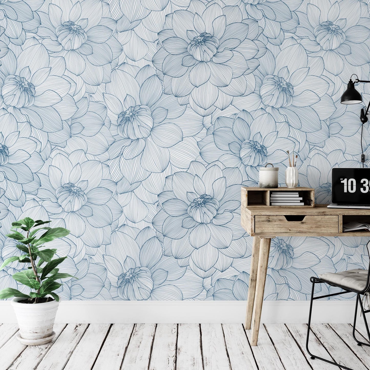 a room with a desk and a flower wallpaper