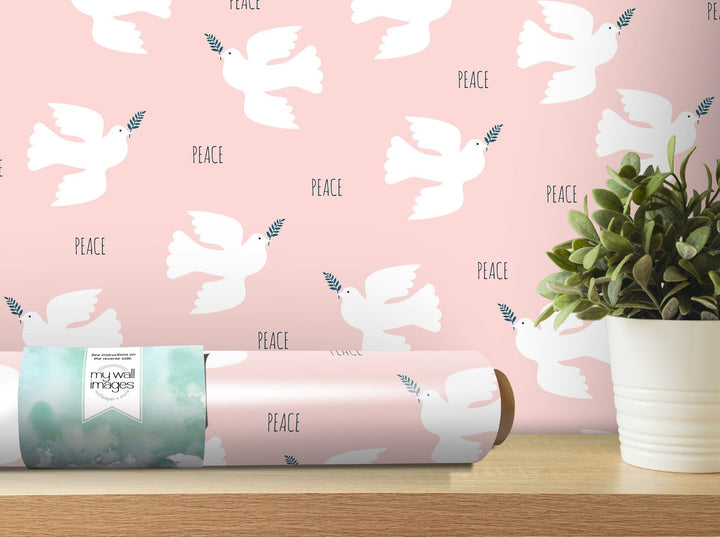 a pink wallpaper with white doves on it