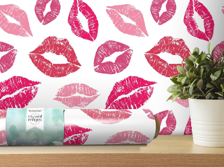 a vase with a plant in it next to a wallpaper