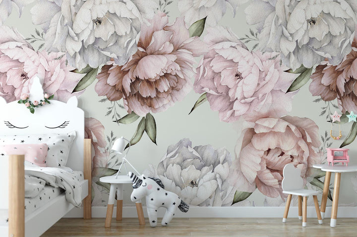 a child&#39;s room with a floral wall mural