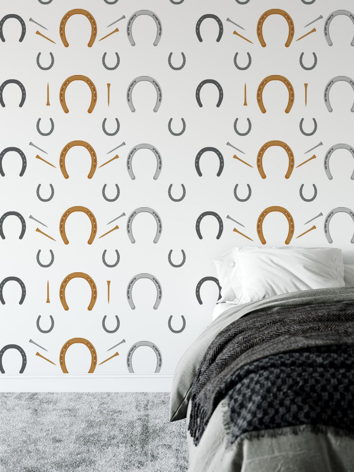 a bedroom with a bed and a wall with a pattern on it