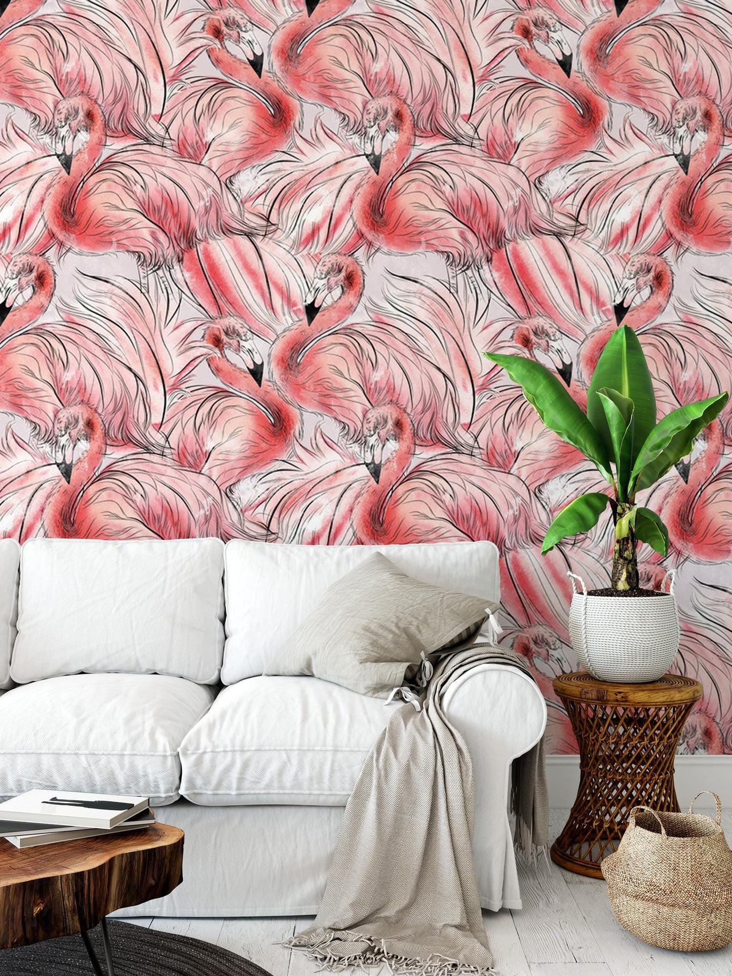 a living room with a white couch and pink wallpaper