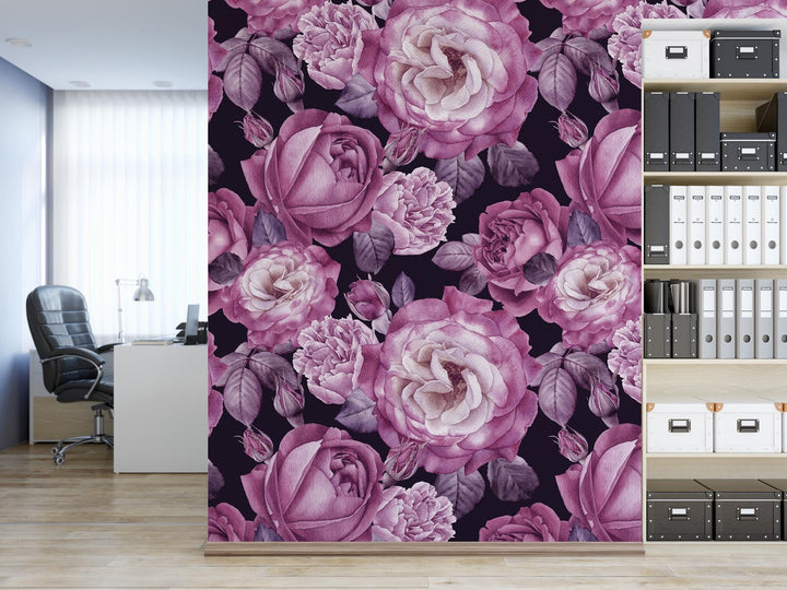 a room with a book shelf and a wall with a flower pattern on it