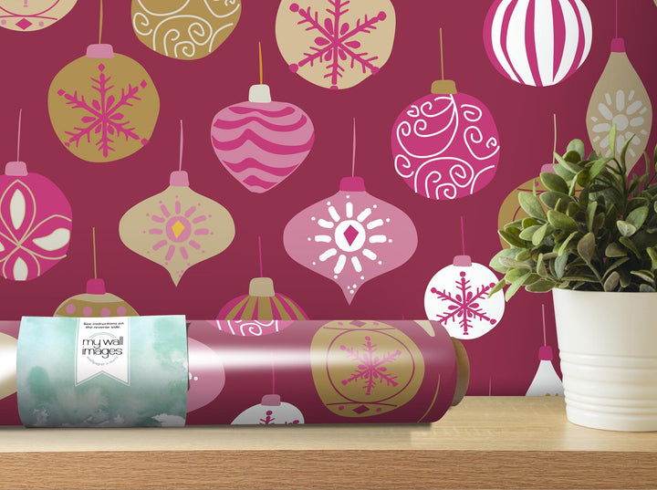 a christmas present wrapped in a pink wrapping paper