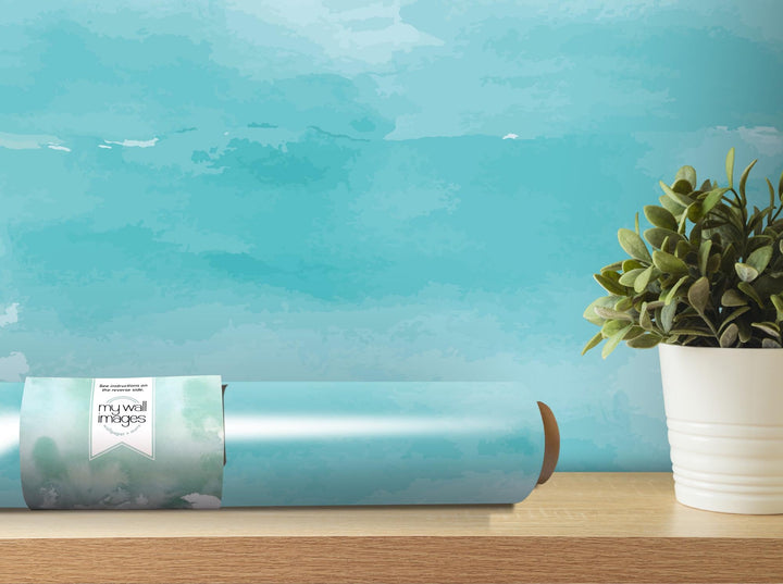 a potted plant sitting on top of a wooden table
