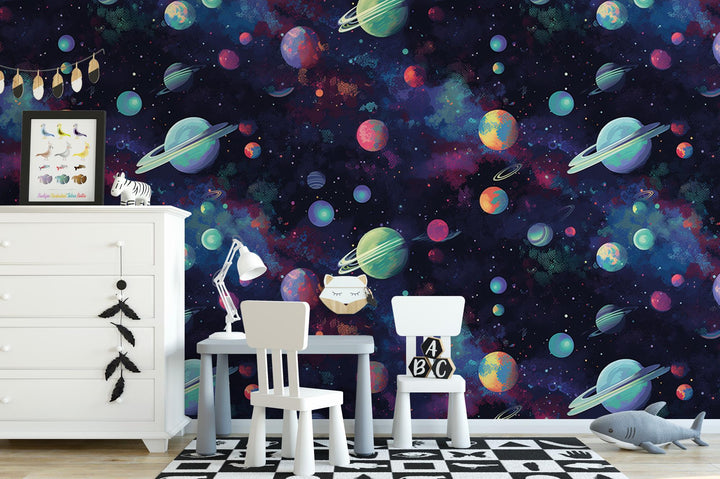 a child&#39;s room with a space themed wallpaper