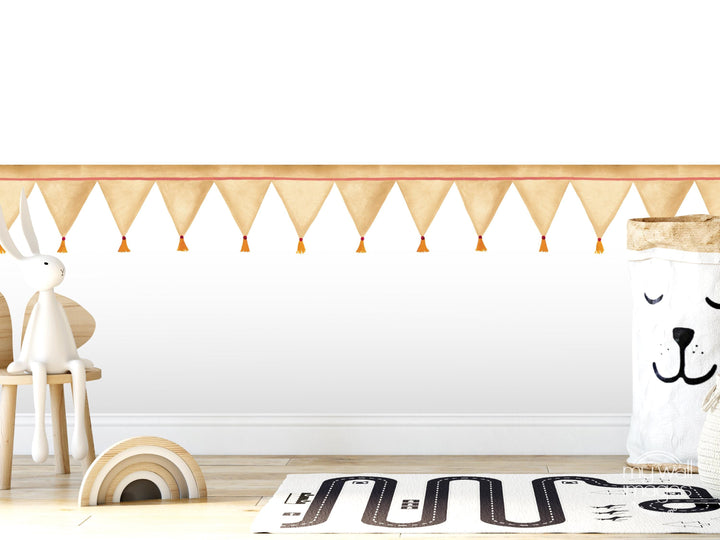 A white rabbit sits on a wooden chair in a room with a white wall, a rug, and a toy car.