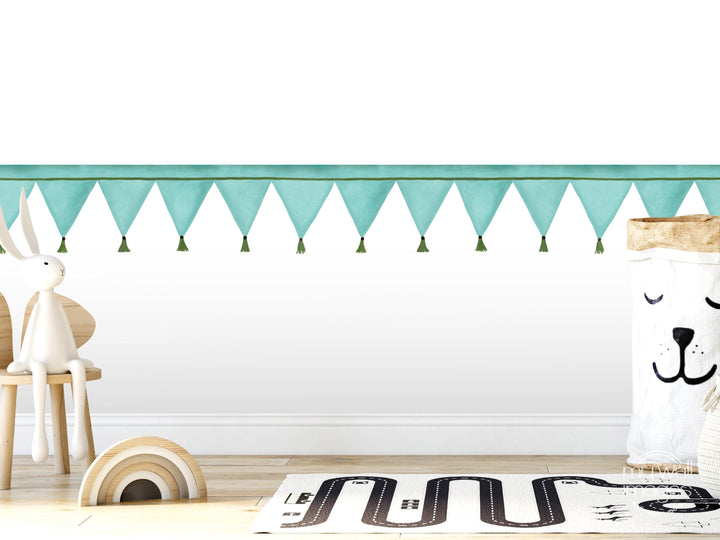 A white rabbit sits on a wooden chair in a room with a white wall, a green banner, and a toy car on the floor.